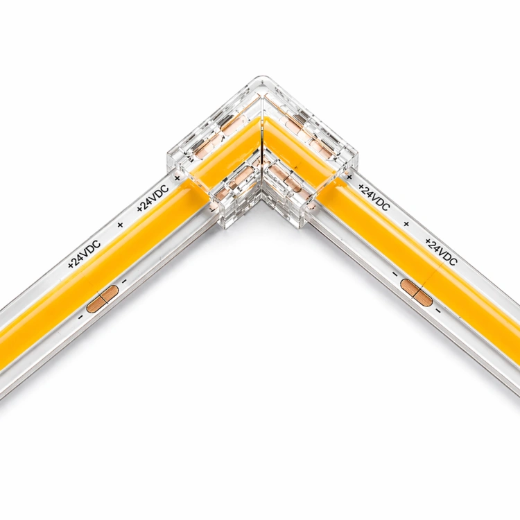 Dwa odcinki taśmy LED podłączone za pomocą złączki kątowej.