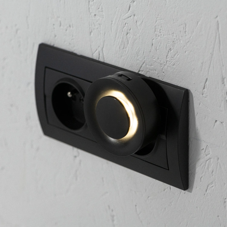 Lampka wtykowa LED RIBI LED WW B 0,33W 1lm barwa ciepłobiała 2700K czarna z czujnikiem ruchu i zmierzchu