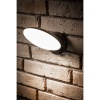 Oprawa TERRO LED 10W 4000K 1000lm czarny IP54 GTV na elewacji.jpg